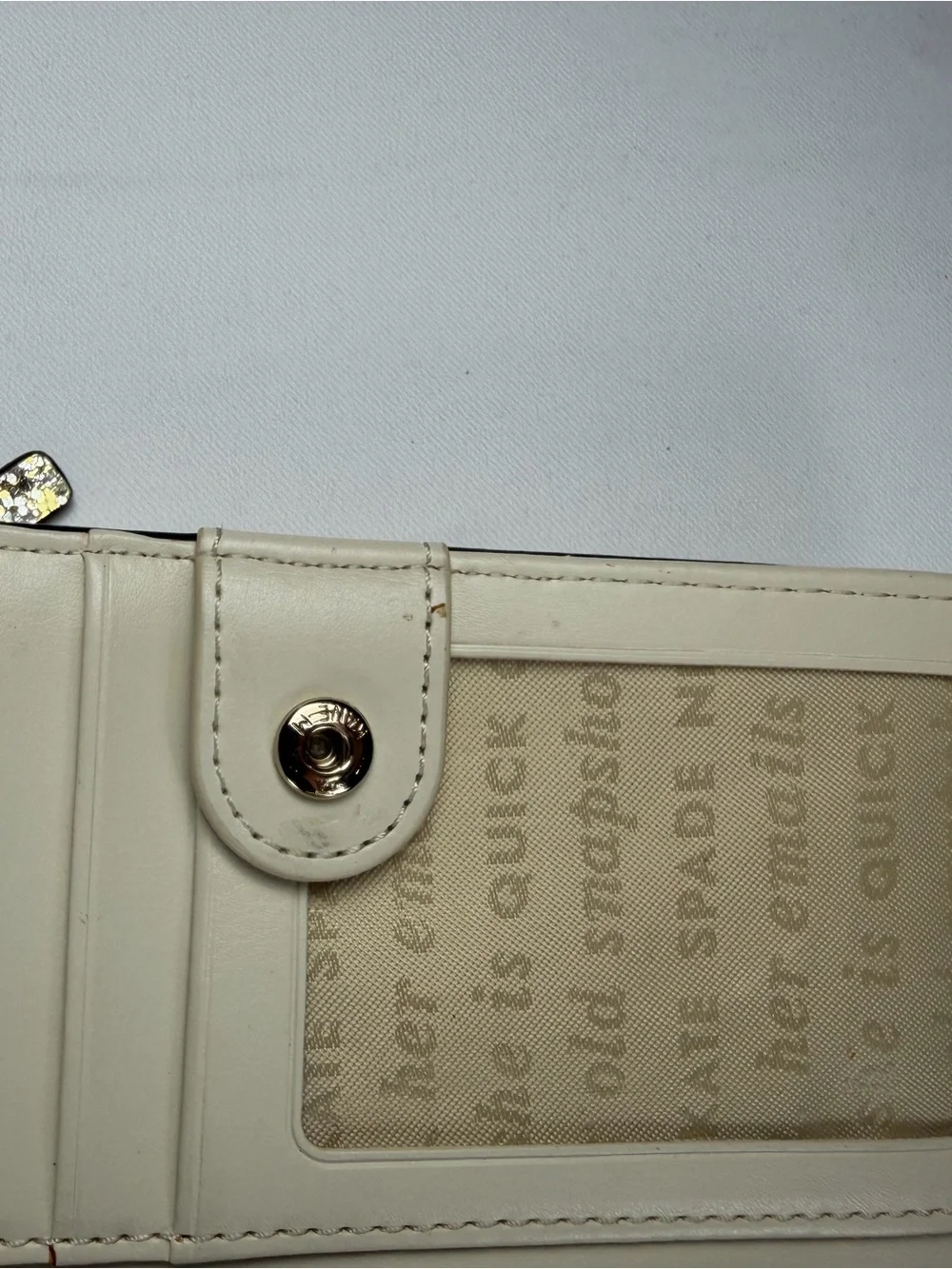 kate spade Gold Glitter Folio wallet with magnetic closure - fun and flirty